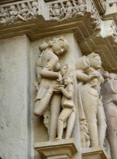 Khajuraho, India: Woman removing a thorn